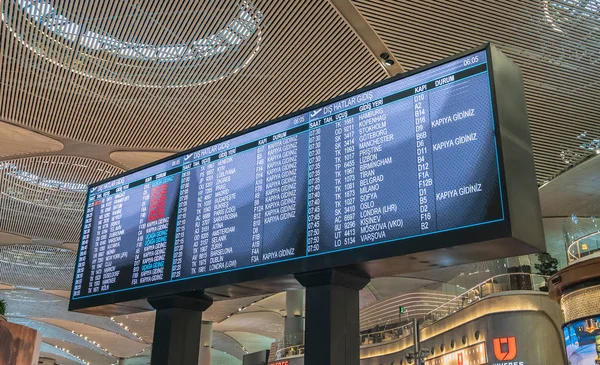 Flight information display in new Istanbul Airport displaying the upcoming flights, Istanbul, Turkey — Stock Photo, Image
