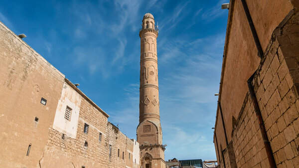 Mardin, Turkey - January 2020: Minaret of Ulu Cami, also known as Great mosque of Mardin