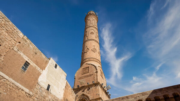 Mardin, Turkey - January 2020: Minaret of Ulu Cami, also known as Great mosque of Mardin
