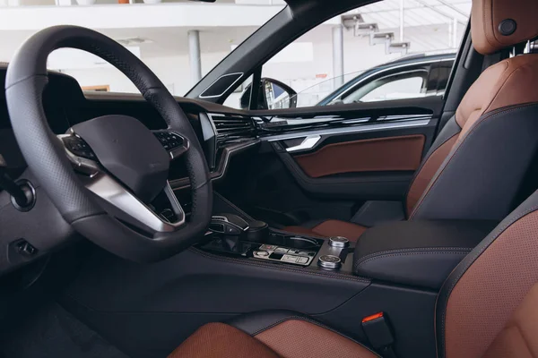 Luxurious interior of a modern vehicle highlighting premium materials, advanced technology, and comfortable seating