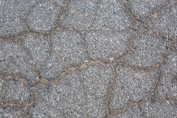 セメントやアスファルトの床の亀裂のテクスチャと背景 — ストック写真