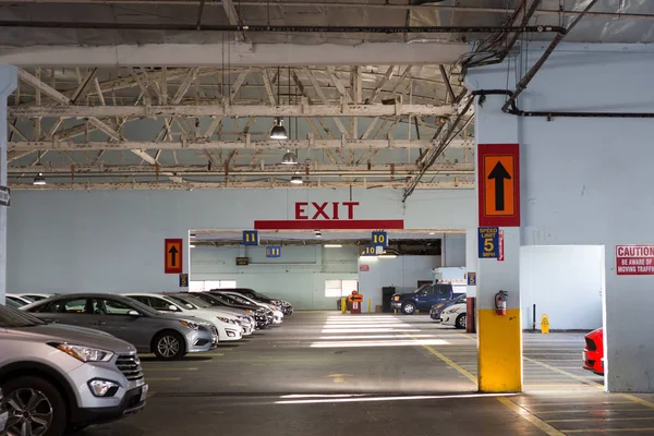 Indoor car parking/garage with exit sign