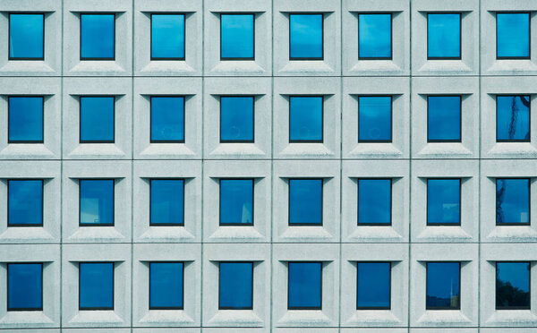 Windows of office buildings in the background