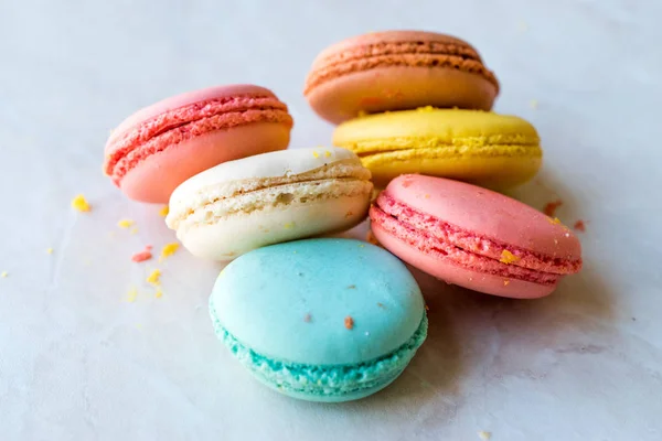 Colorful French or Italian Macarons stack / Macaroon Cakes. Traditional Dessert.