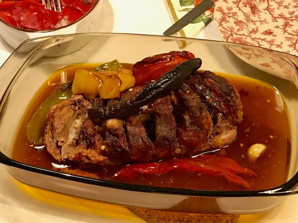 Lamb Arm Tandoori / Tandouri Food in Glass Bowl at Dinner Table. Organic Meat Food.