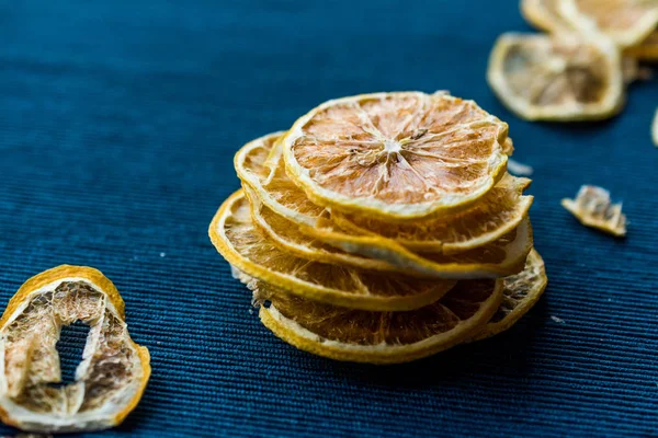 Stack Dried Lemon Slices Blue Surface Dry Sliced Organic Food — Stock Photo, Image