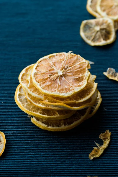 Stack Dried Lemon Slices Blue Surface Dry Sliced Organic Food — Stock Photo, Image