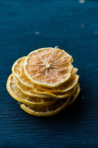 Stack Dried Lemon Slices Blue Surface Dry Sliced Organic Food — Stock Photo, Image