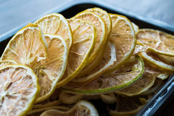 Package of Dried Lemon Slices / Dry and Sliced in Plastic Box / Container. Organic Food.