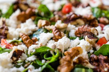 Curd Cheese Salad with Walnut, Arugula Rucola or Rocket Leaves /