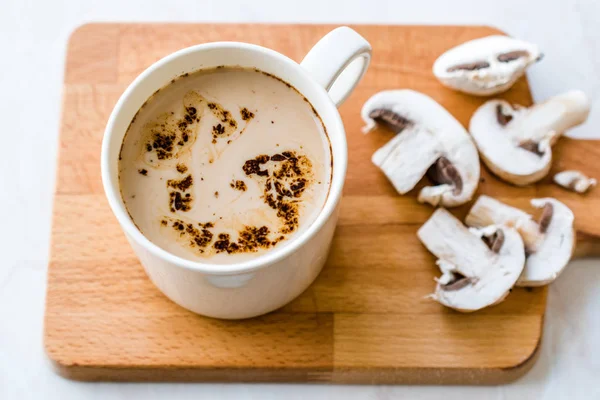 Mushroom Latte Coffee with Milk and Espresso on Wooden Board Rea