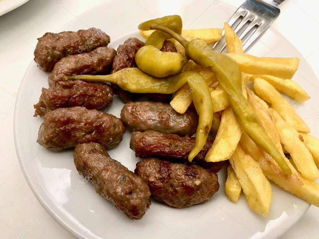 Turkish Food Kofte / Kofta with Red Hot Sauce and Potatoes serve