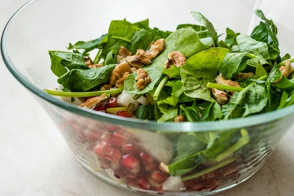 Fresh Walnut Salad with Pomegranate and Pear Slices in Glass Bowl — Stock Photo, Image