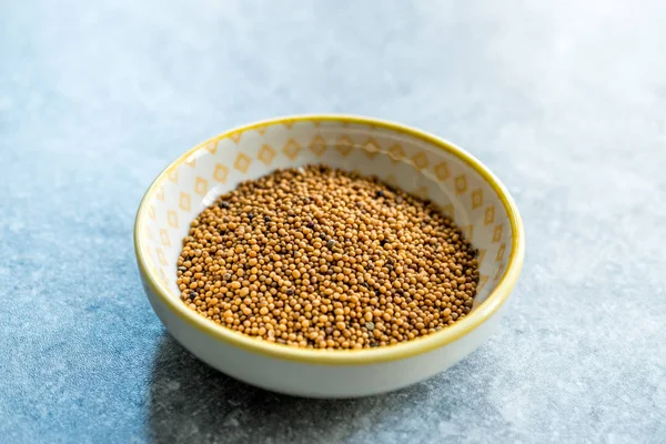 Yellow Mustard Seeds in Small Porcelain Bowl. — Stock Photo, Image