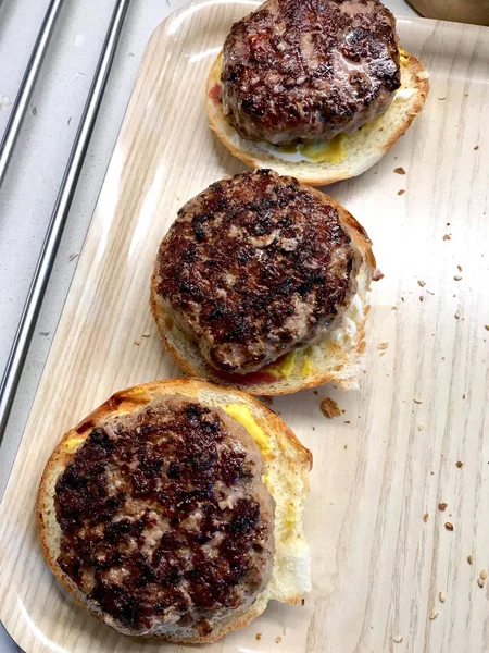 Grilled Hamburger Patty on Bread Ready to Serve