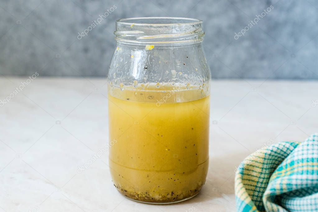 Salad Dressing Mustard Sauce in Glass Bowl Ready to Use.