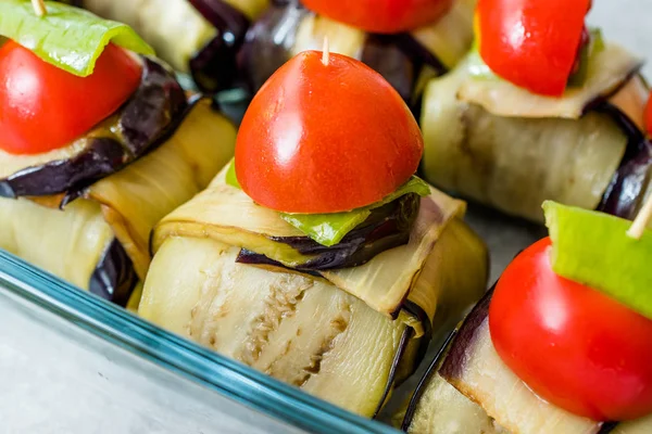 Patlıcana Sarılmış Köfteli ve Çeri Domatesli Islim Köfte Kebabı / Patlıcan Dilimleri.