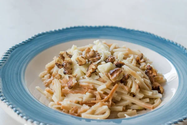 Turkish Homemade Food Noodle / Eriste with Cheese and Walnuts.