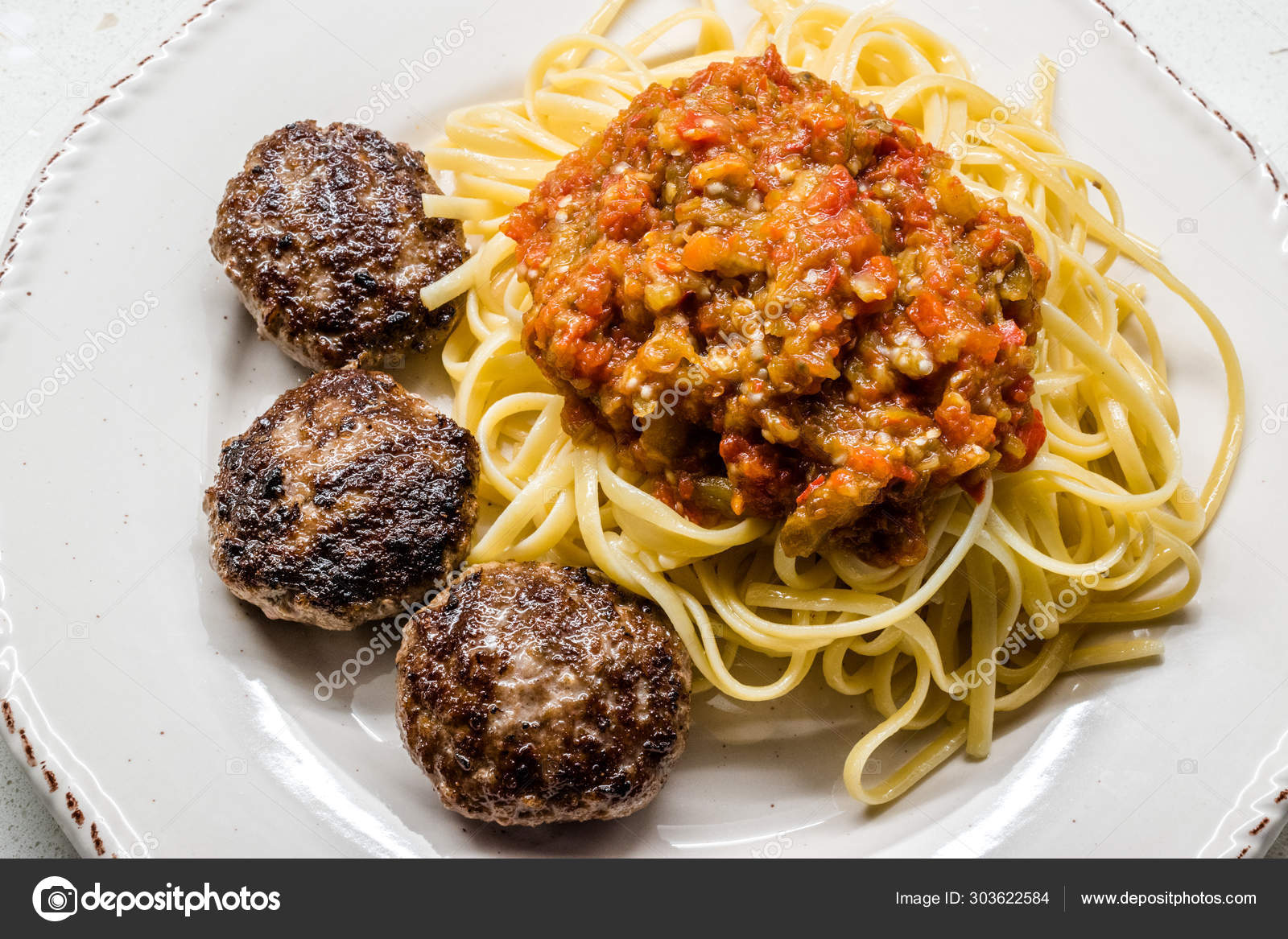 Bolognese Spaghetti with Meatballs / Bolognaise Tomato Sauce. Stock