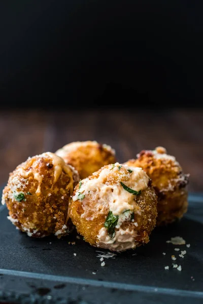 Fried Mac and Cheese Balls with Parmesan Cheese and Mayonnaise / Macaroni Bites.