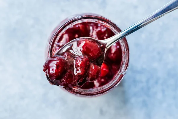 Cranberry Jam in Jar with Spoon / Cranberries Marmalade served with Bread Slices for Breakfast. — Stock Photo, Image