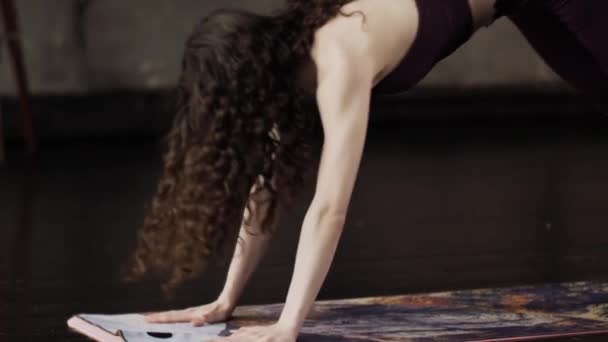 Close-up of the girl who does an active exercise out of yoga — Stock Video