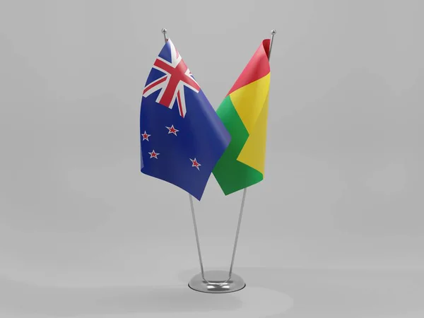 Guinea Bissau Banderas Cooperación Nueva Zelanda Fondo Blanco Render — Foto de Stock