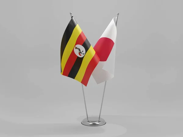 Japan Uganda Flaggor För Samarbete Vit Bakgrund Render — Stockfoto