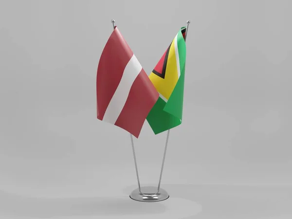 Guyana Banderas Cooperación Letonia Fondo Blanco Render —  Fotos de Stock