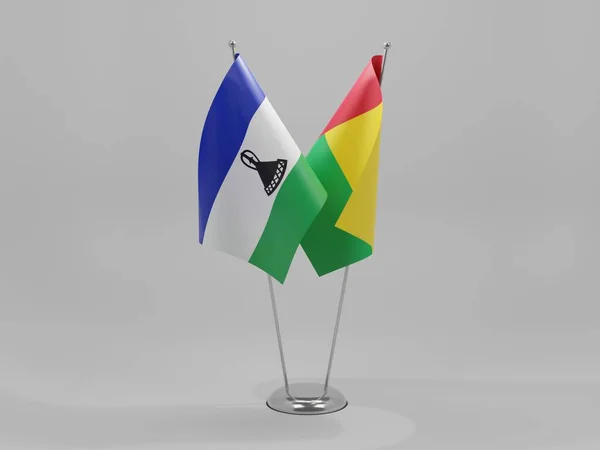 Guinea Bissau Bandiere Cooperazione Lesotho Sfondo Bianco Render — Foto Stock