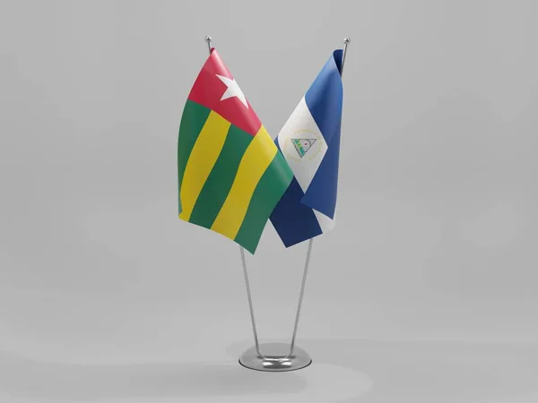 ニカラグア トーゴ協力旗 白背景 3Dレンダリング — ストック写真