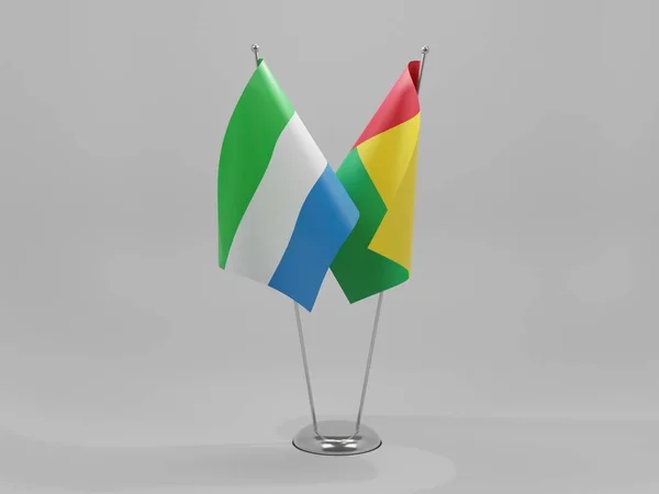 Guinea Bissau Banderas Cooperación Sierra Leona Fondo Blanco Render —  Fotos de Stock