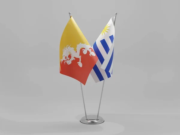 Uruguai Bandeiras Cooperação Butão Fundo Branco Render — Fotografia de Stock