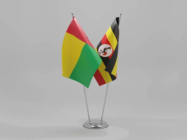 Uganda Banderas Cooperación Guinea Bissau Fondo Blanco Render —  Fotos de Stock