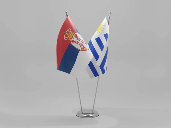 Uruguay Banderas Cooperación Serbia Fondo Blanco Render —  Fotos de Stock