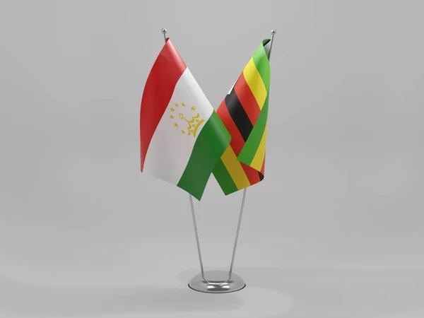 Zimbabue Banderas Cooperación Tayikistán Fondo Blanco Render — Foto de Stock