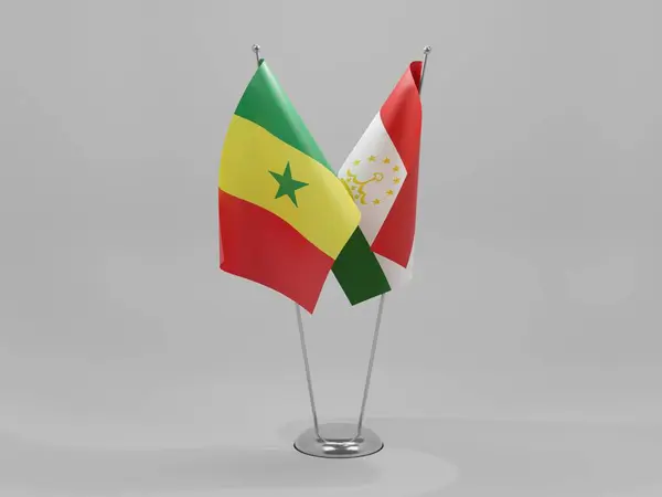 Tajiquistão Bandeiras Cooperação Senegal Fundo Branco Render — Fotografia de Stock