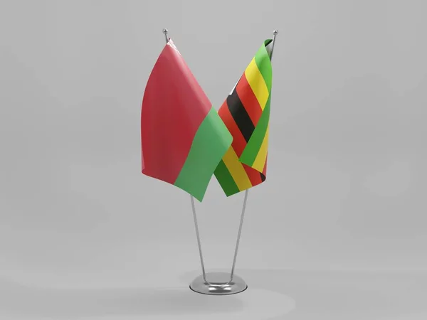 Zimbabwe Vitrysslands Samarbetsflaggor Vit Bakgrund Render — Stockfoto