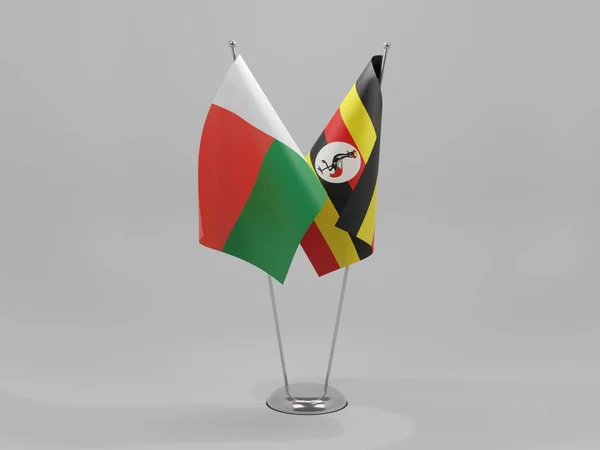 Uganda Banderas Cooperación Madagascar Fondo Blanco Render —  Fotos de Stock