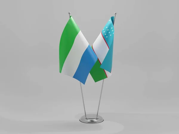 乌兹别克斯坦 塞拉利昂合作旗 白色背景 3D渲染 — 图库照片