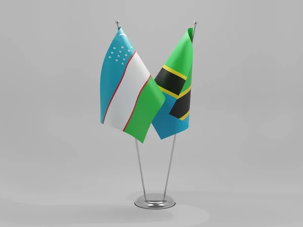 Tanzânia Bandeiras Cooperação Usbequistão Fundo Branco Render — Fotografia de Stock