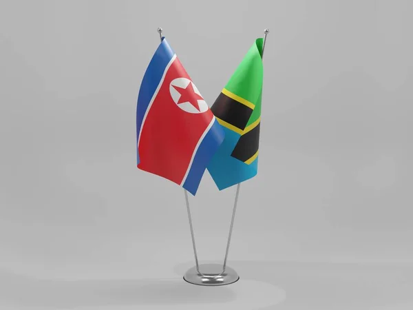 Tanzânia Bandeiras Cooperação Coreia Norte Fundo Branco Render — Fotografia de Stock
