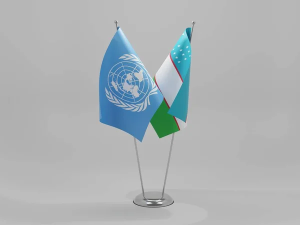 ウズベキスタン 国連協力旗 白の背景 3Dレンダリング — ストック写真
