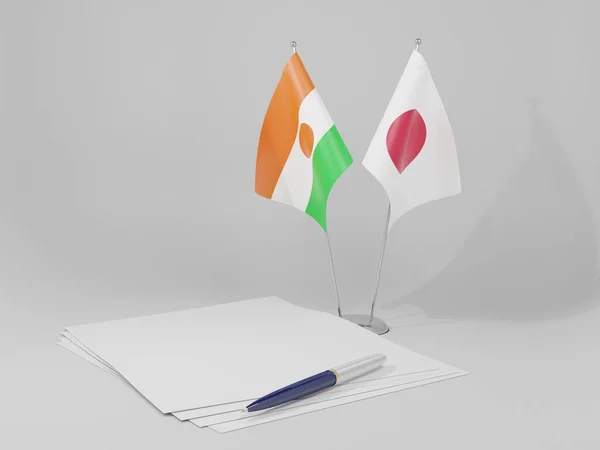 Japão Bandeiras Acordo Com Níger Fundo Branco Render — Fotografia de Stock