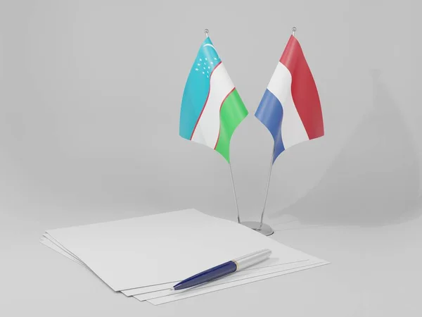 Nederländerna Uzbekistan Flaggor Vit Bakgrund Render — Stockfoto