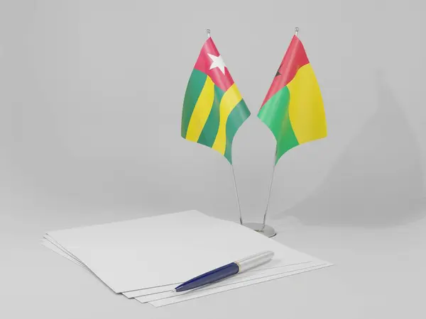 Guinea Bissau Banderas Del Acuerdo Togo Fondo Blanco Render —  Fotos de Stock