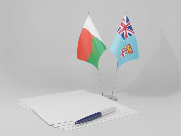 Fiji Bandeiras Acordo Madagascar Fundo Branco Render — Fotografia de Stock