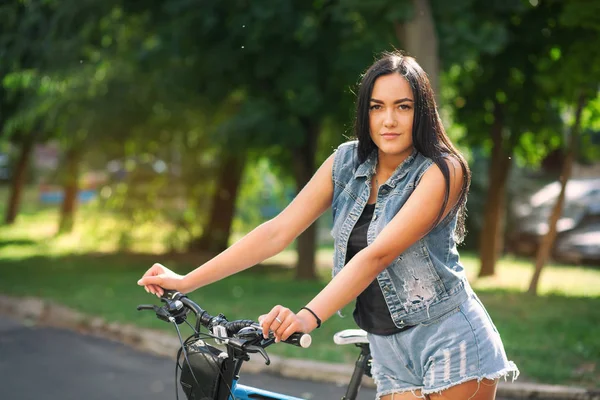 Young Pretty Brunette Girl Denim Shorts Bicycle Street Summer — Stock Photo, Image