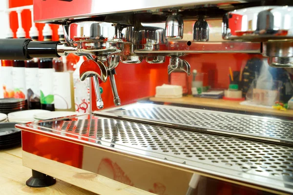 Making coffee in a cafe in the summer. Coffee machine.