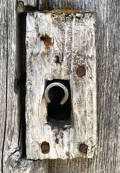 old vintage door lock in a massive wooden door